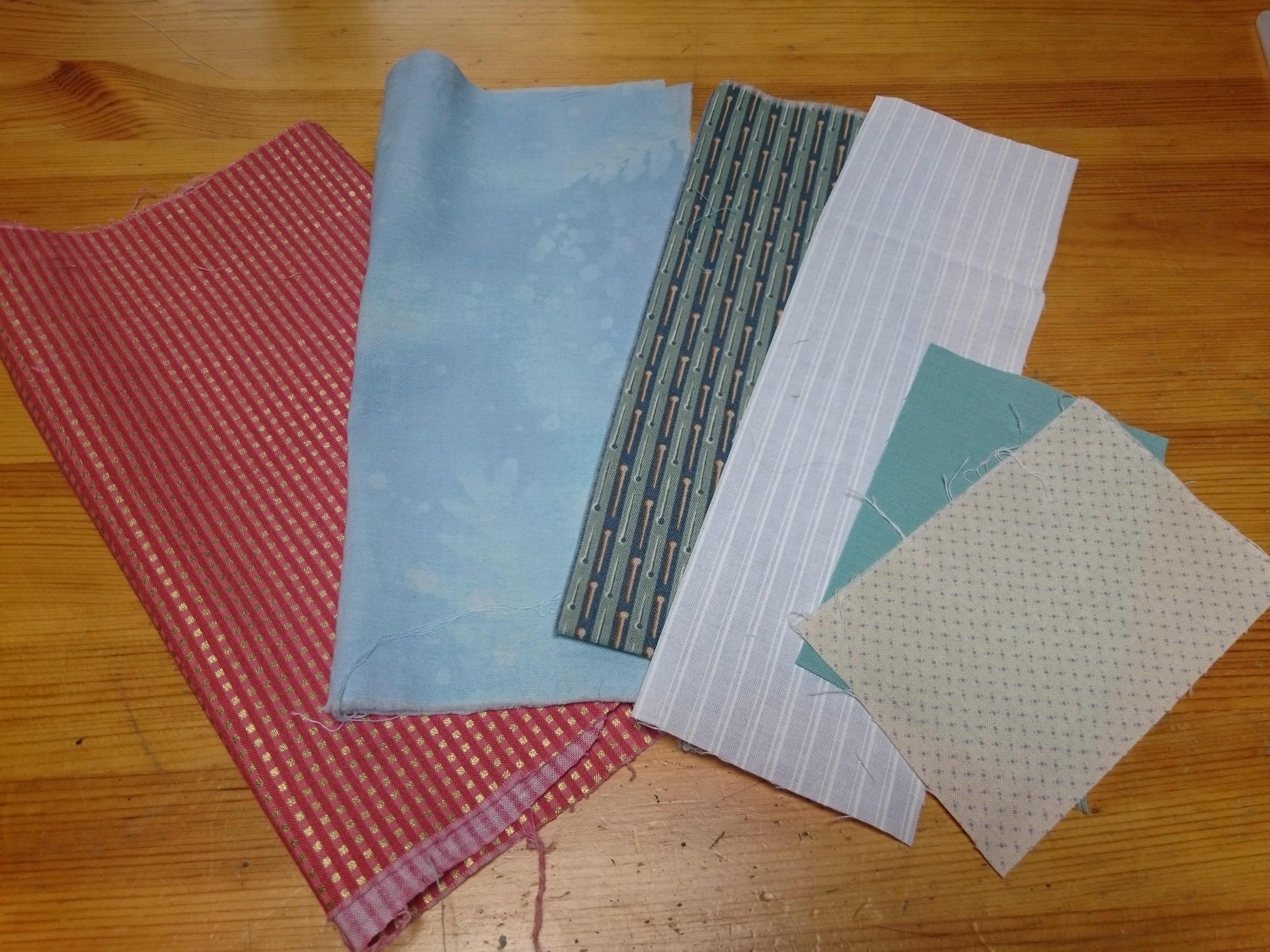 Fabrics for Happy House block.JPG