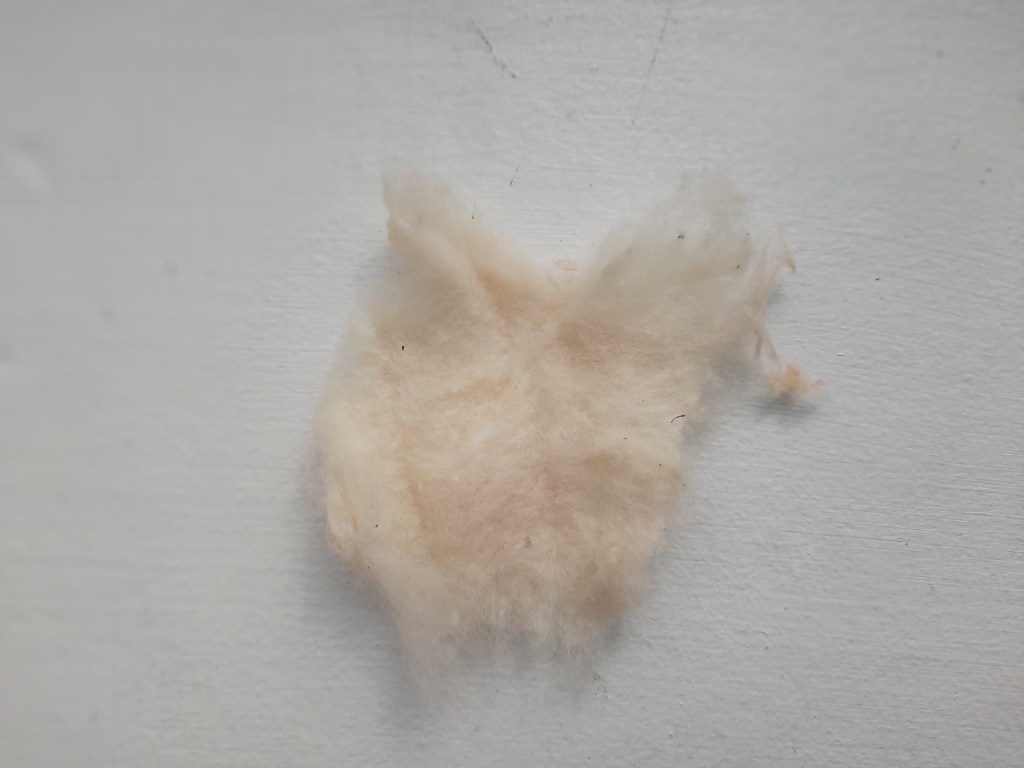 unbleached cotton wadding used on a vintage coathanger