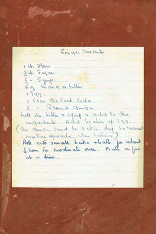 A tea towel design featuring a 1940s recipe for Ginger Biscuits by Amanda Jane Textiles, the recipe is a facsimile of a handwritten recipe on cream paper with a wide tan border