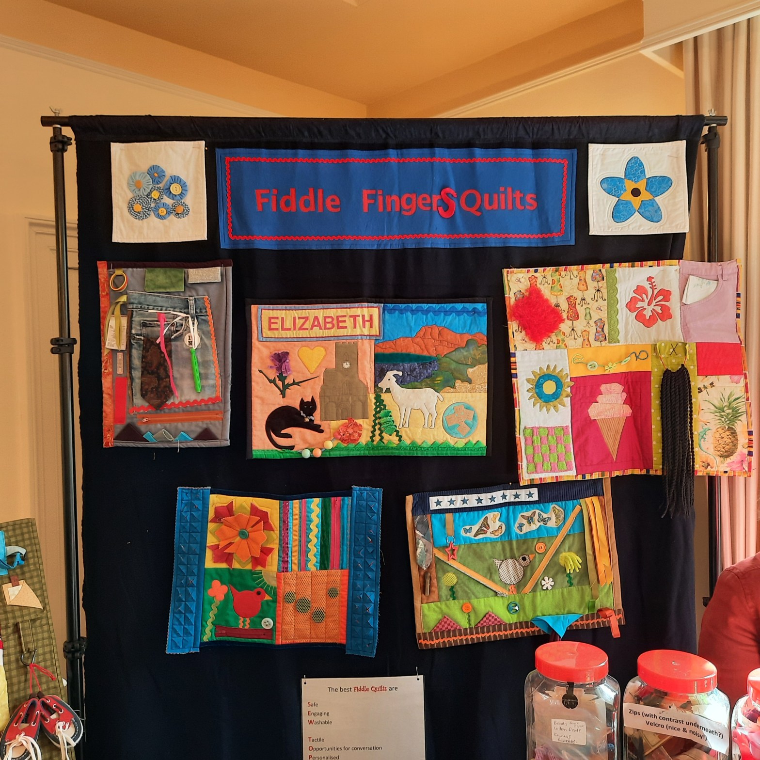 Fiddle Fingers Quilts stand at the QGBI conference 2022