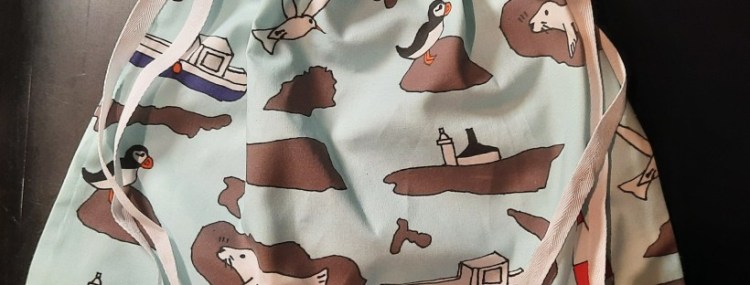 Drawstring bag made from 'Farne Islands' fabric by Amanda Jane Textiles