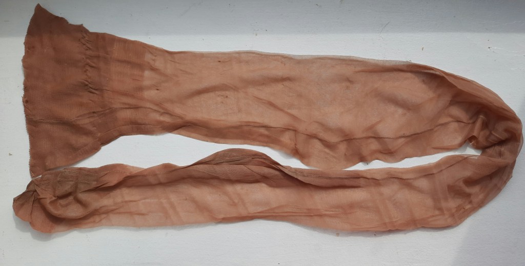 stockings used to bind a vintage coathanger
