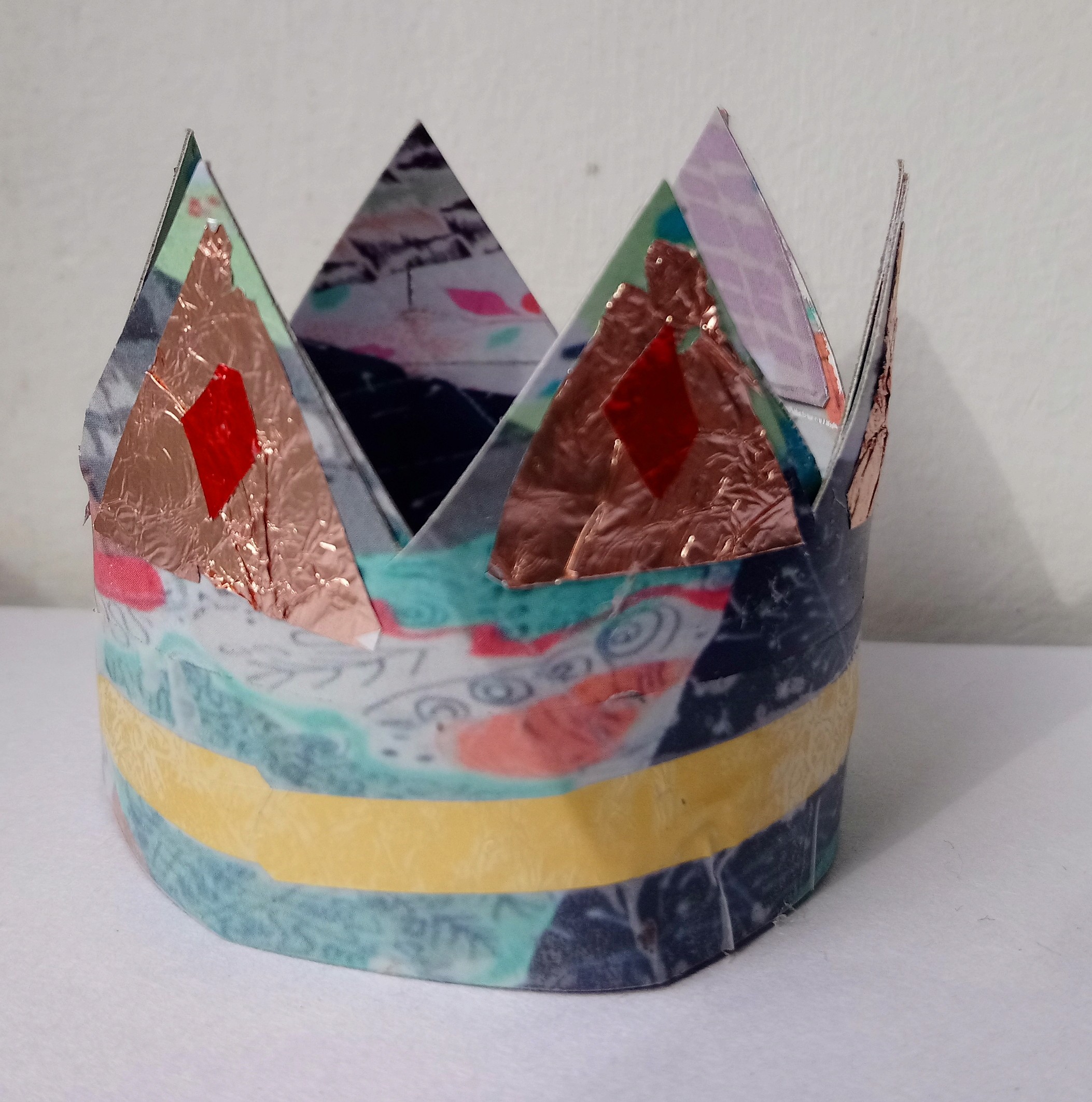 Small decorative paper-collage crown by Amanda Jane Ogden
