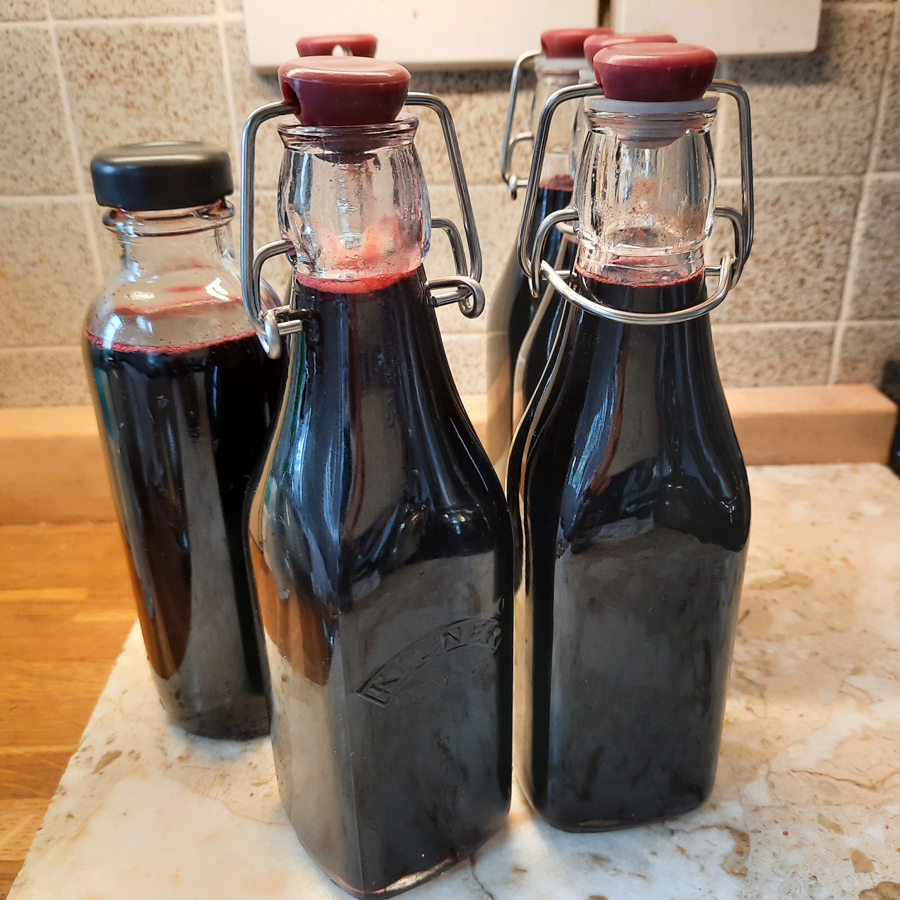 Bottles of elderberry syrup