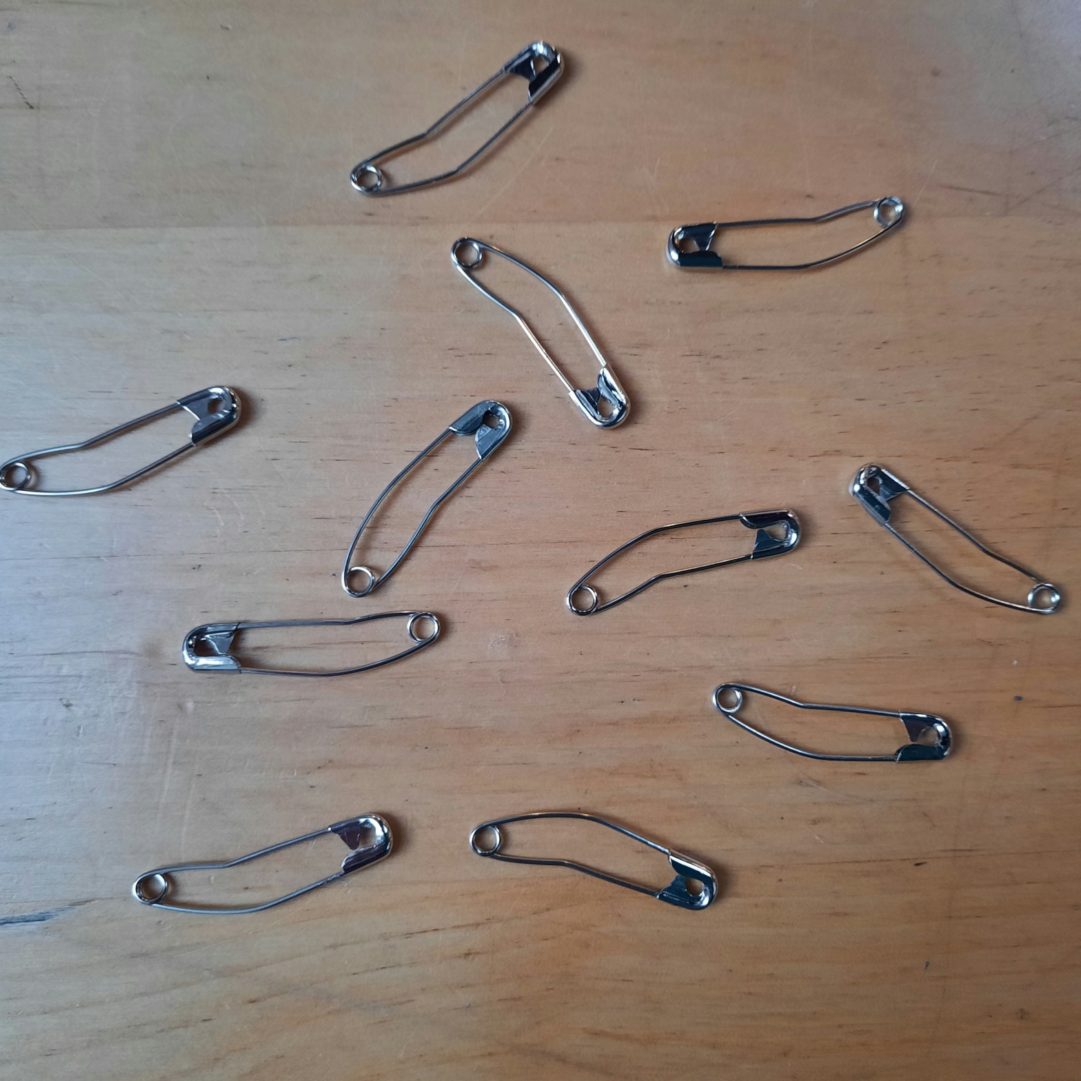 quilter's pins, curved safety pins for holding the layers of a quilt