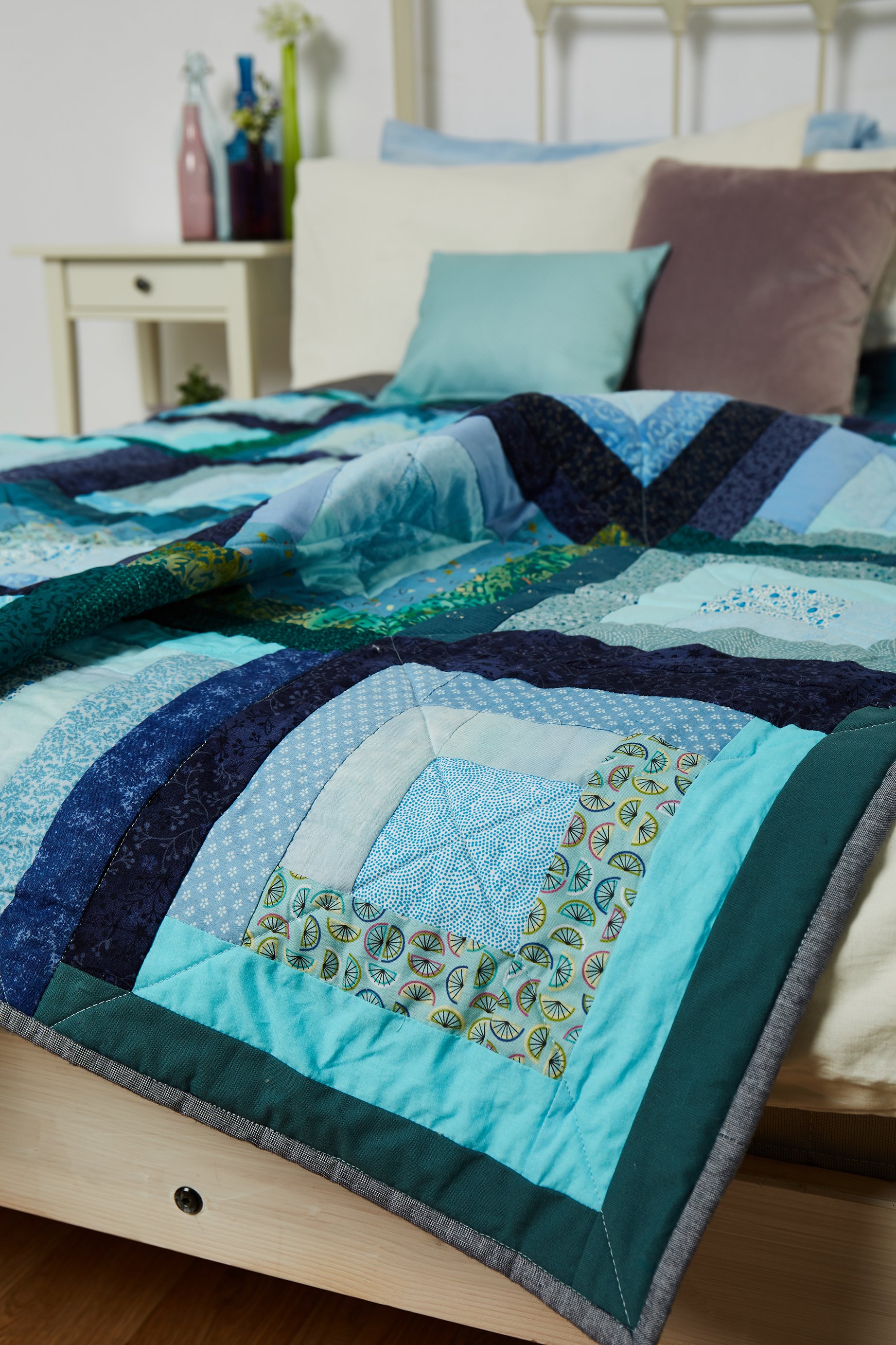 A blue and green quilt by Amanda Jane Ogden in Quilt Now issue 74