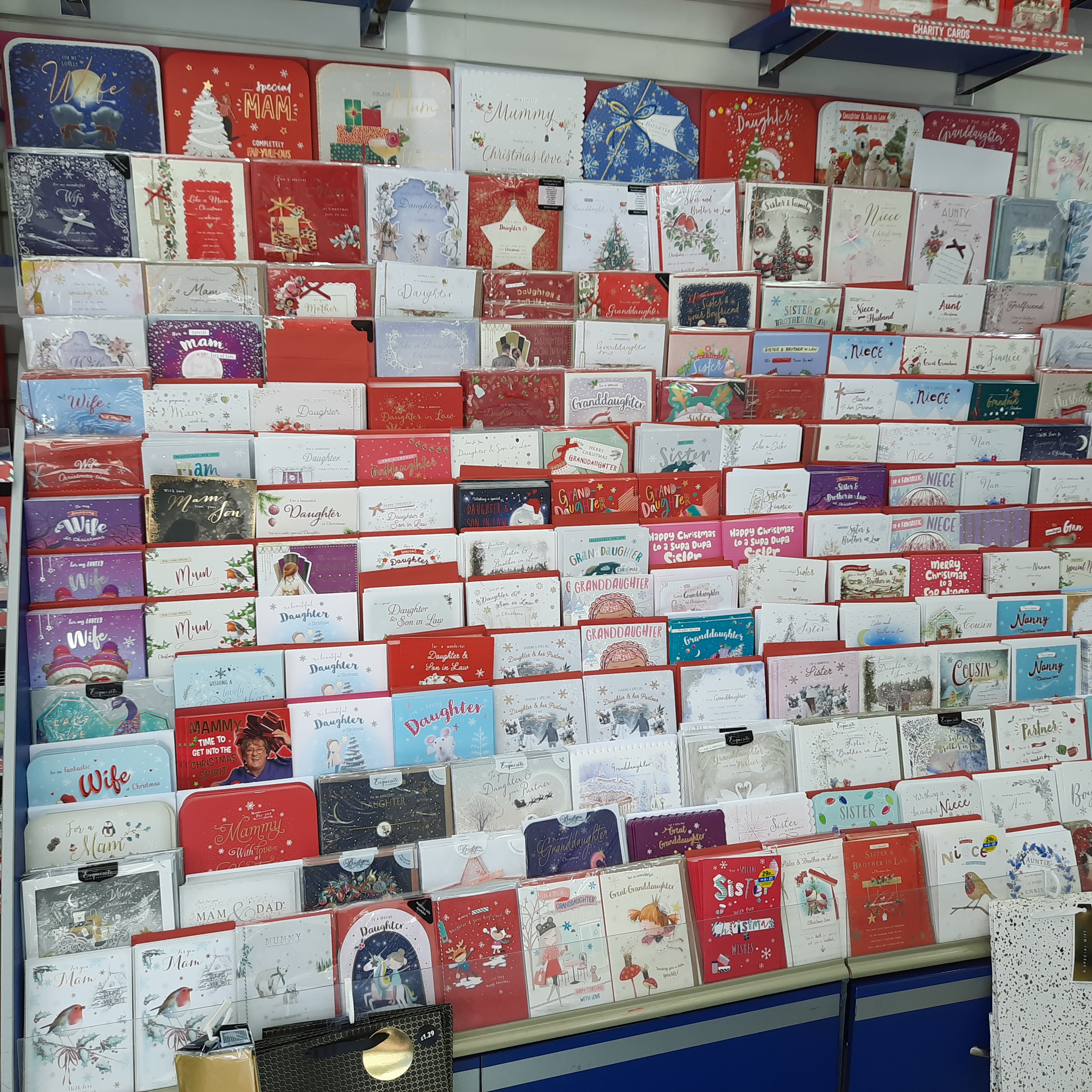 shop Christmas card display in September