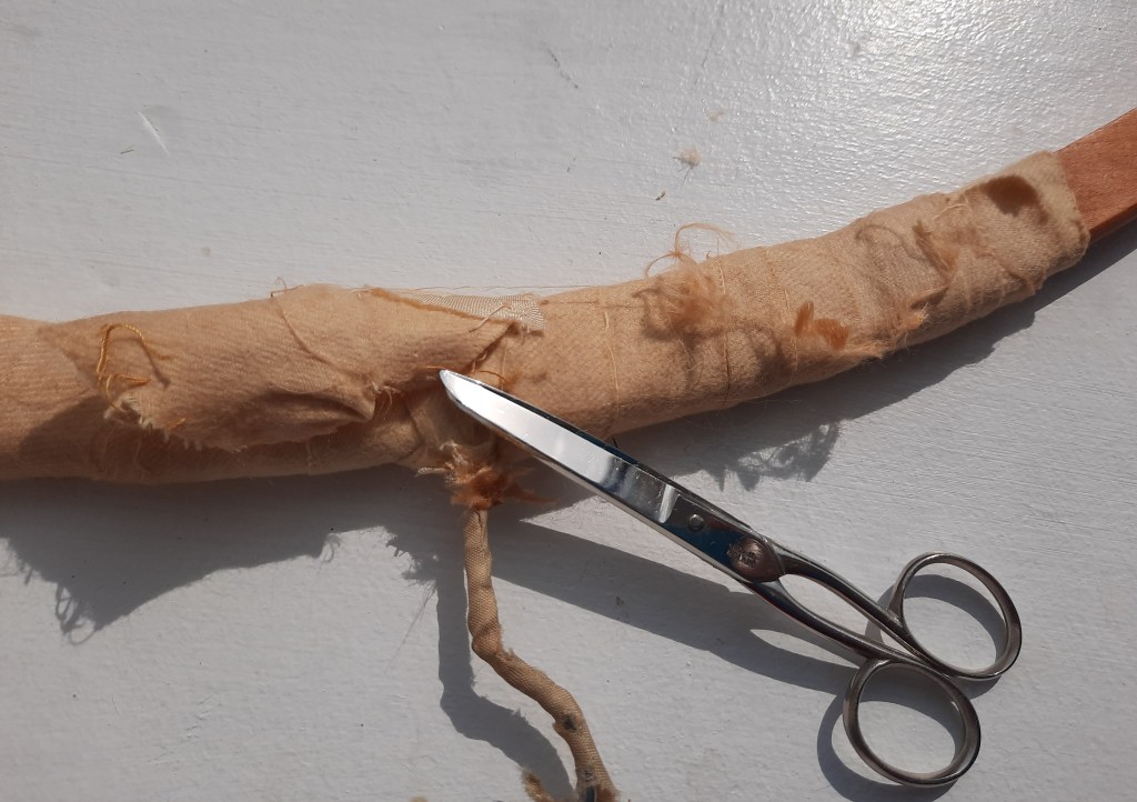 stockings used to pad a vintage hanger 2