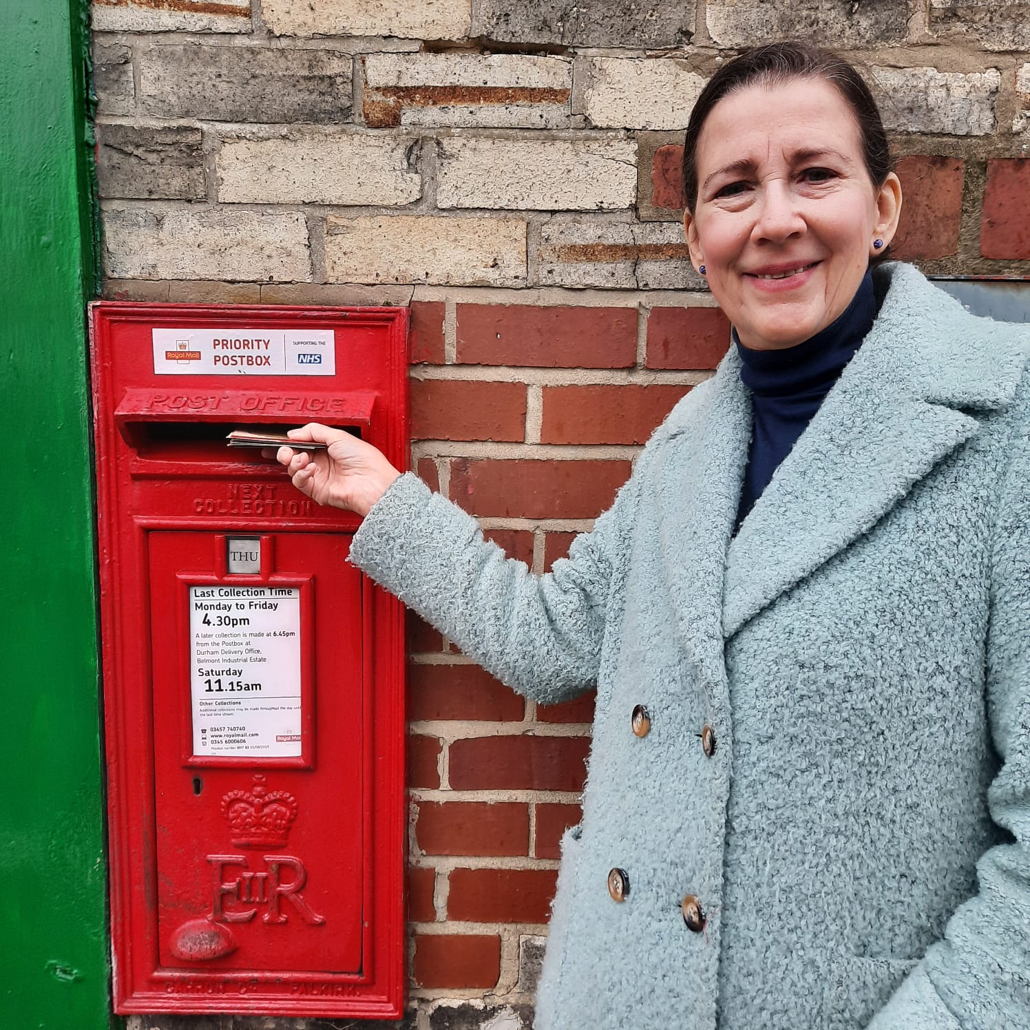 Amanda sending postcards