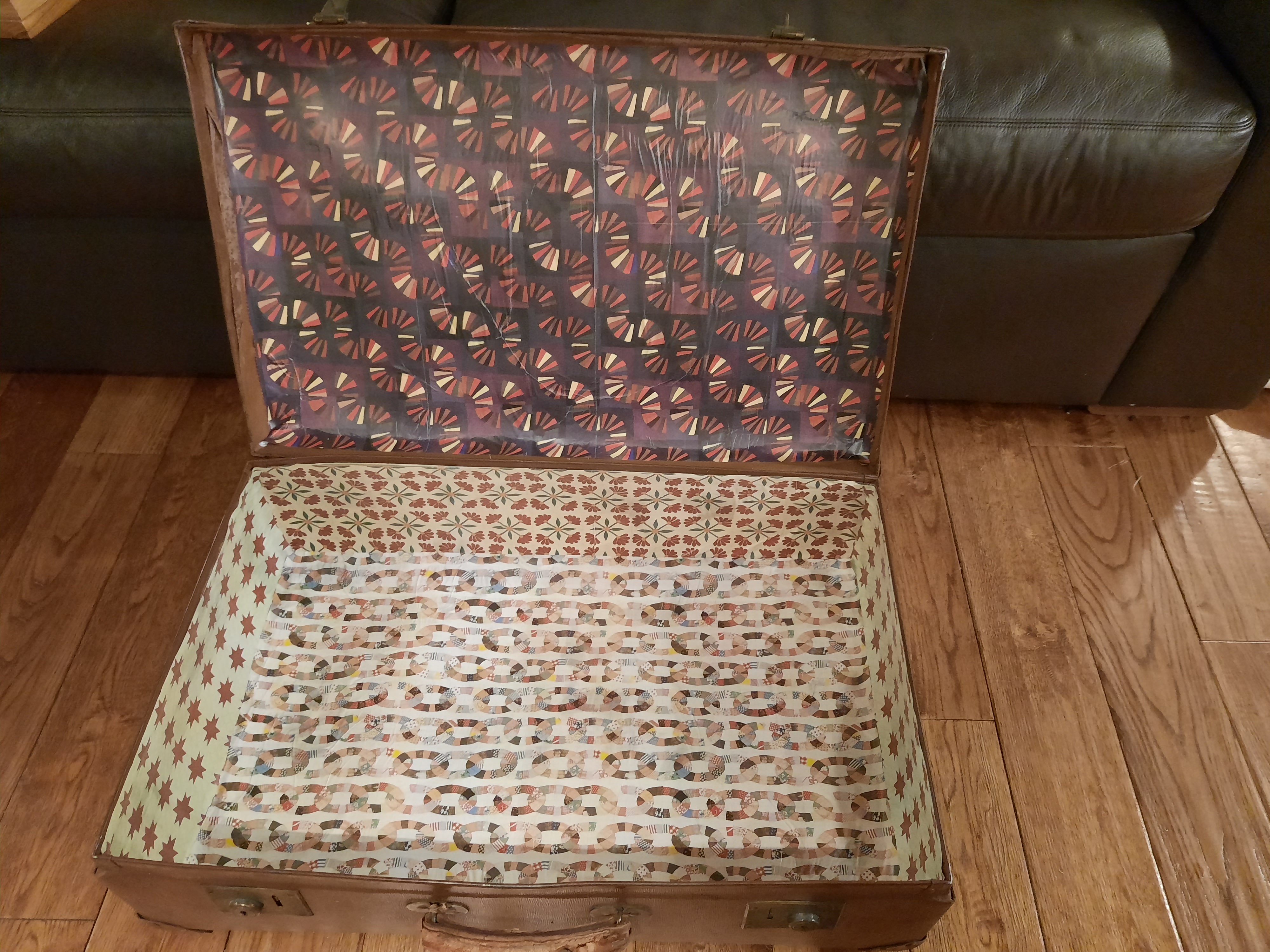 Updating a vintage suitcase with a paper lining