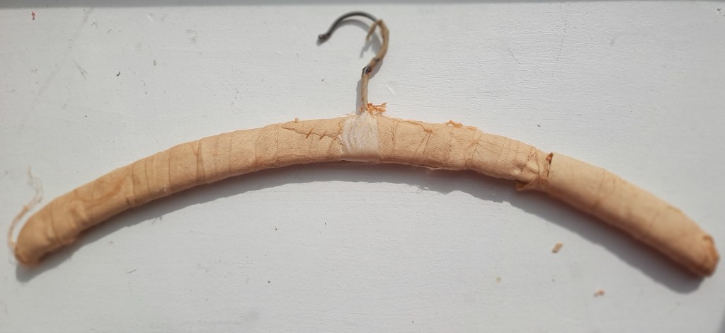 stocking used to pad a vintage hanger