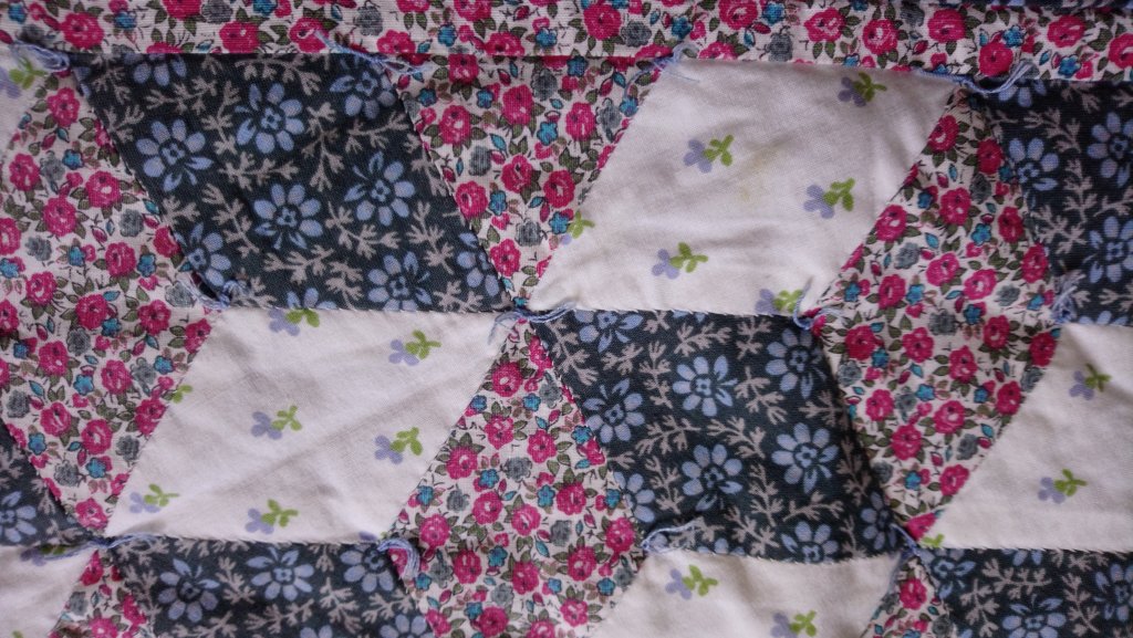 close-up of baby blocks in a quilt