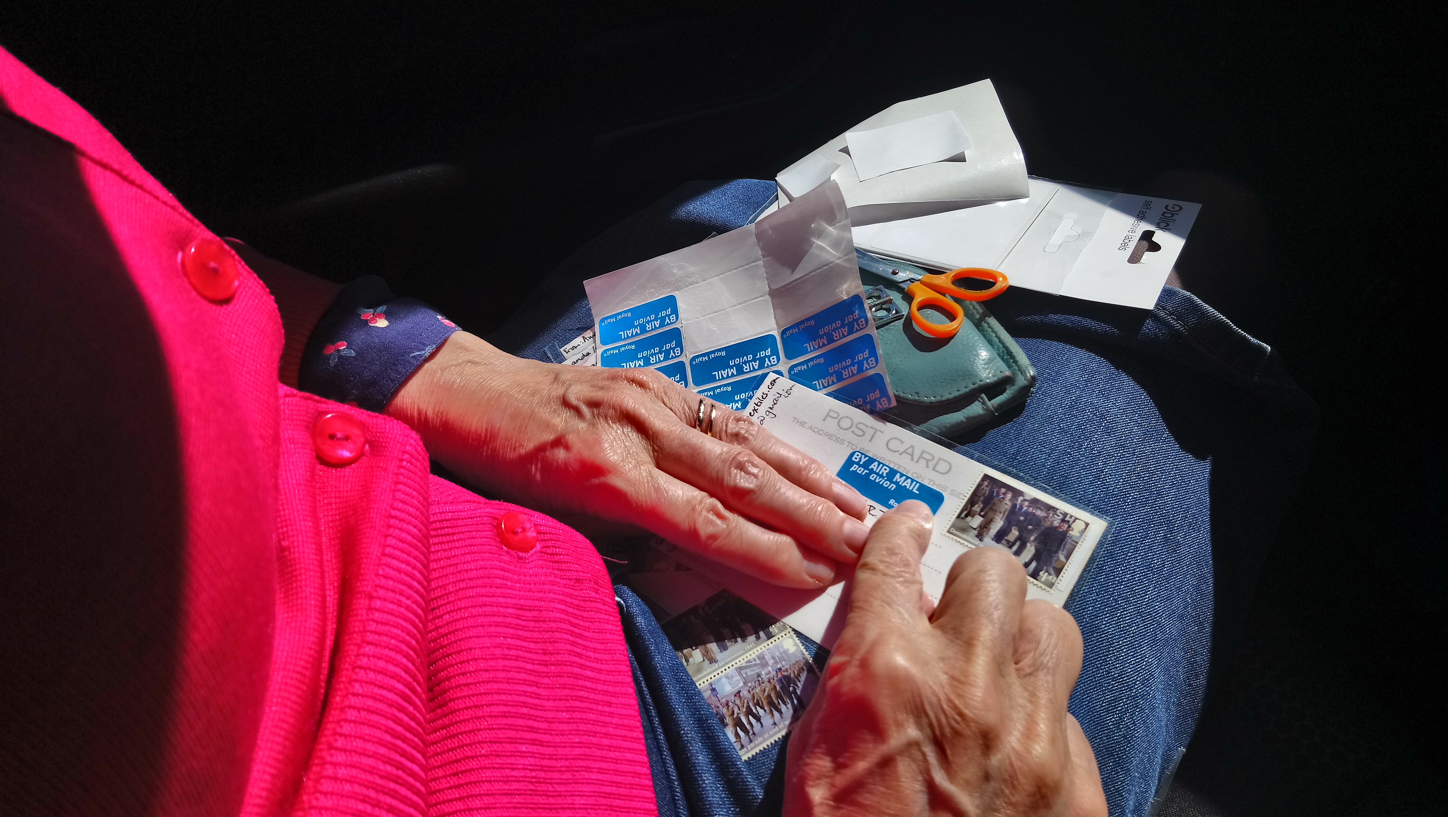 Adding stamps to postcards for the iHanna postcard swop