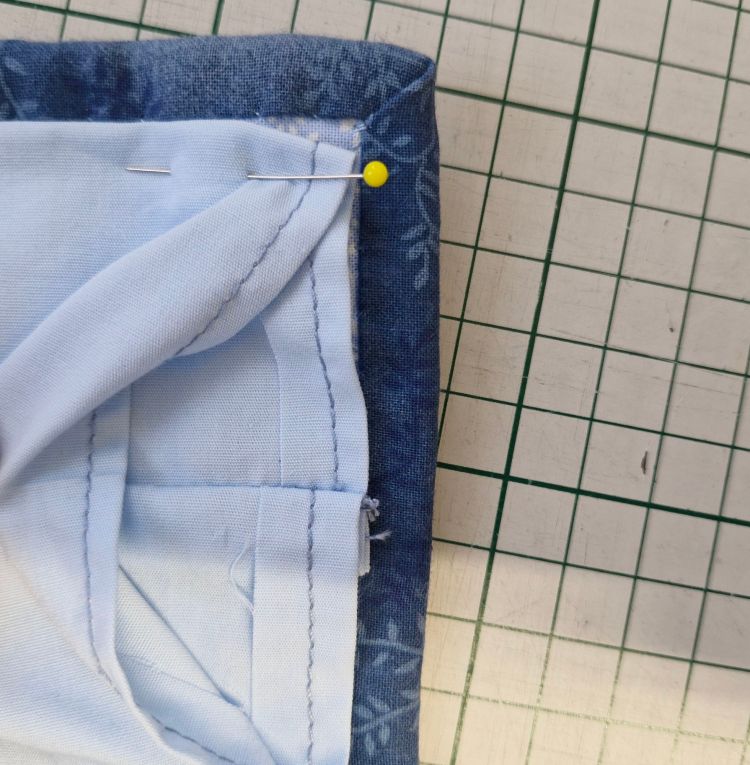 a hanging sleeve for a quilt ready to be stitched into place