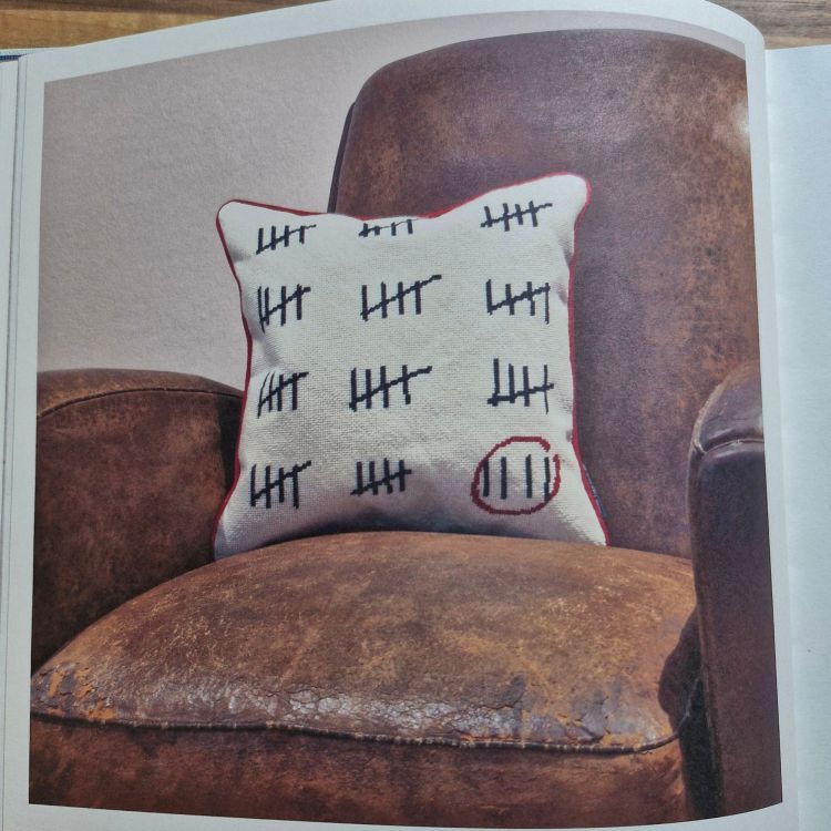 needlepoint cushion designed by A A Gill, made by Fine Cell Work