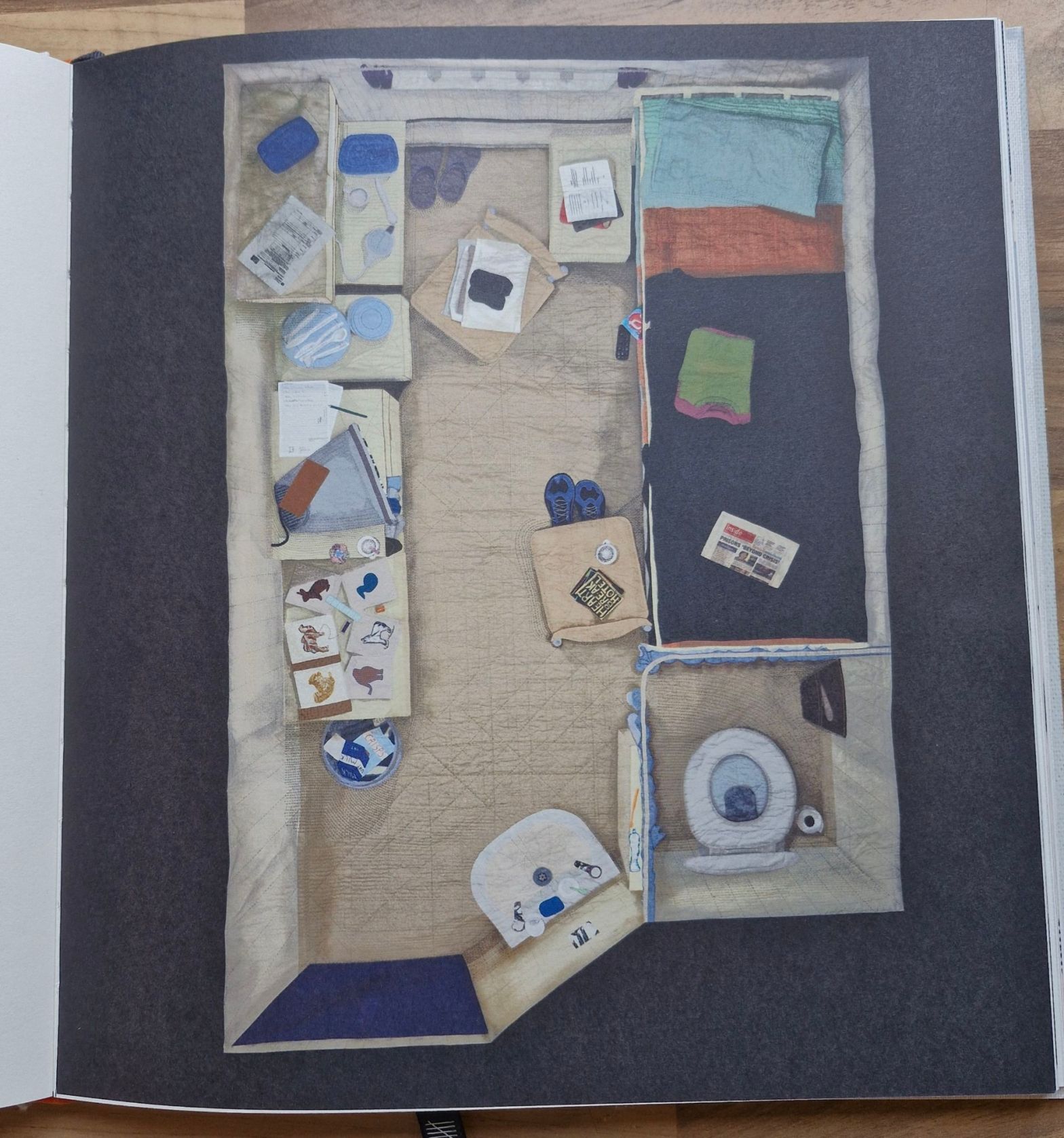 Group quilt depicting a prison cell, coordinated by Fine Cell Work volunteer Marianne Ford