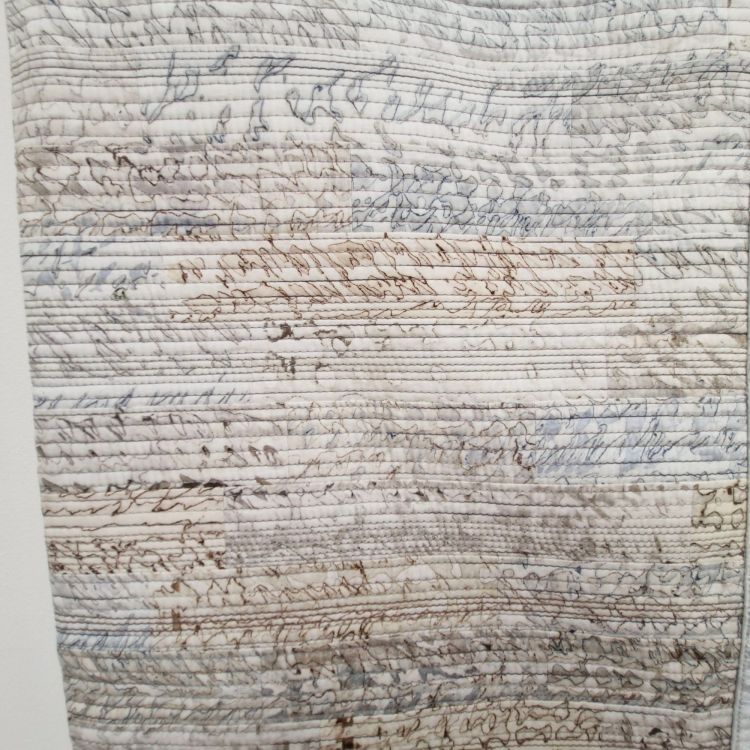 The close-up shows the printing patterns on the cloth.