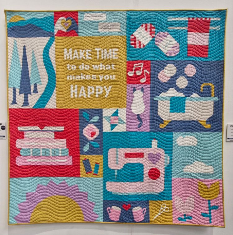 'Make Time' quilt in the Group category, made by British Se -a-Row, designed by various group members (@thecraftynomadfleet)