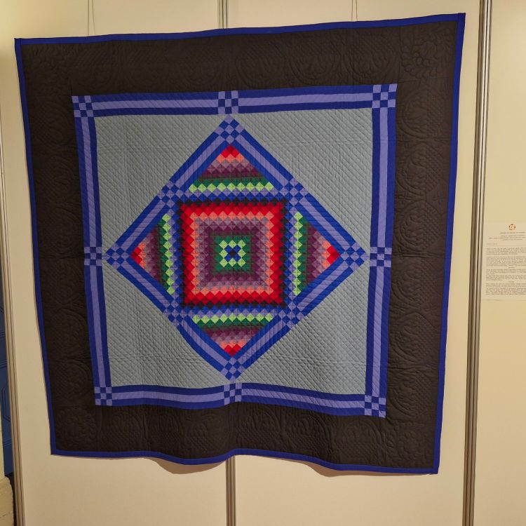 'Sunshine and Shadow in a Diamond quilt, Amish, by Mary and Jake Glick, 1998, Lancaster County, Pennslyvania at the Carrefour Europeen de Patchwork 2025