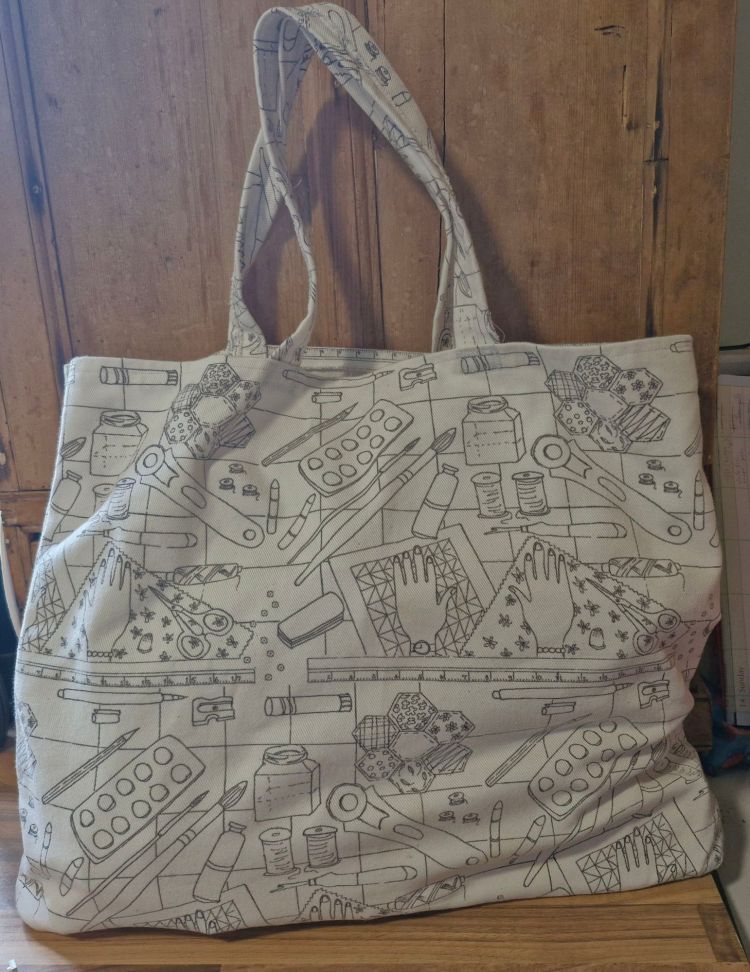 White cloth printed bag with 'The work of my hands' print