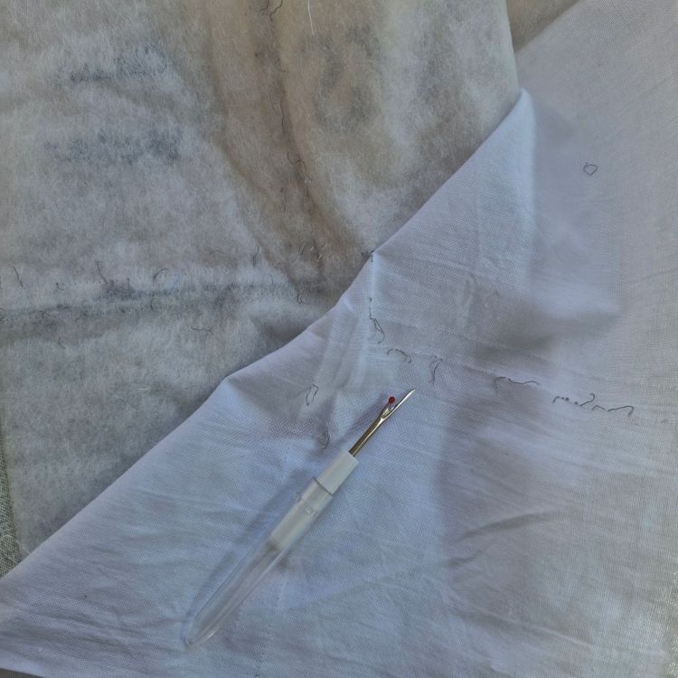 Fabric, wadding and an unpicker