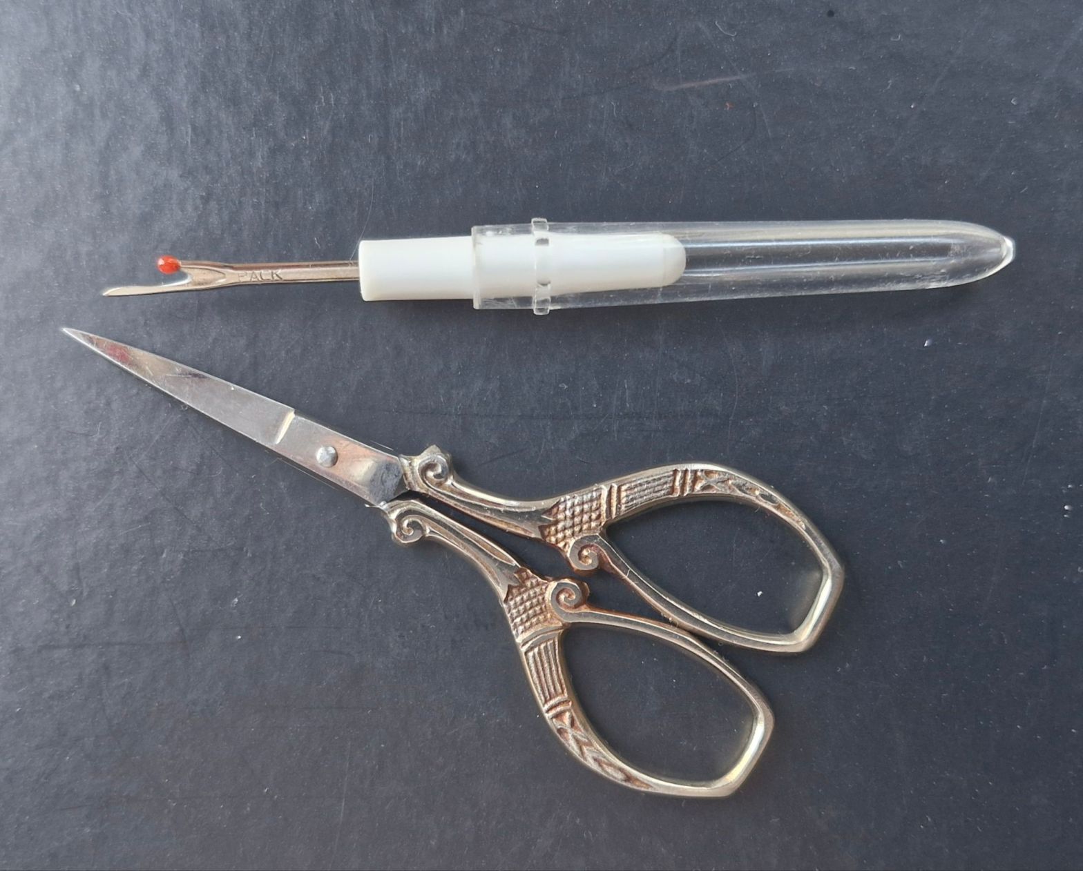 An un-picker and sharp embroidery scissors